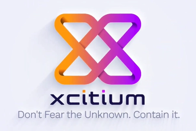 team-reviewing-work-on-laptop